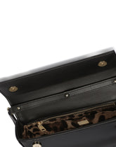 Polished calfskin moon bag with DG logo - | Dolce & Gabbana