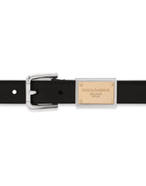 Calfskin belt with branded tag - | Dolce & Gabbana