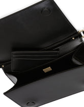 Phone bag with branded maxi-plate - | Dolce & Gabbana