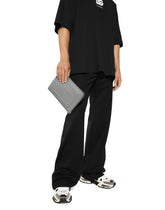 Small calfskin pouch with raised logo - | Dolce & Gabbana