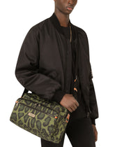 Nylon messenger bag with a leopard print against a green background and branded plate - | Dolce & Gabbana