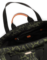 Nylon travel bag with leopard print against a green background and branded plate - | Dolce & Gabbana