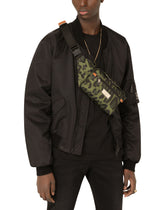 Nylon belt bag with leopard print against a green background and branded plate - | Dolce & Gabbana