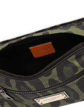 Nylon belt bag with leopard print against a green background and branded plate - | Dolce & Gabbana