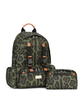 Nylon backpack with leopard print against a green background and branded plate - | Dolce & Gabbana