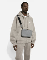 Calfskin belt bag with raised logo - | Dolce & Gabbana