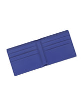 Calfskin bifold wallet with raised logo - | Dolce & Gabbana