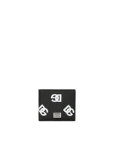 Calfskin bifold wallet with all-over DG print - | Dolce & Gabbana