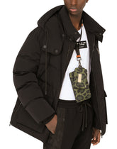 Nylon multi-purpose kit with leopard print against a green background and branded plate - | Dolce & Gabbana