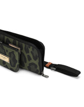 Nylon multi-purpose kit with leopard print against a green background and branded plate - | Dolce & Gabbana