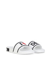 Rubber beachwear sliders with high-frequency detailing - | Dolce & Gabbana