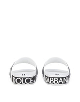 Rubber beachwear sliders with high-frequency detailing - | Dolce & Gabbana