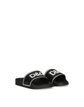 Rubber and calfskin sliders with logo print - | Dolce & Gabbana