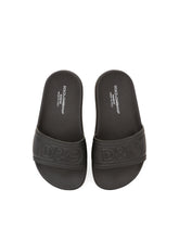 Sliders with DG logo in rubberized calfskin - | Dolce & Gabbana