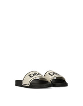 Rubber and calfskin sliders with logo print - | Dolce & Gabbana