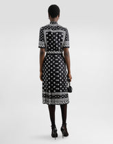 Pleated longuette skirt in silk twill with allover DG logo scarf print - | Dolce & Gabbana