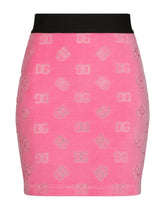 Flocked jersey miniskirt with all-over DG logo - | Dolce & Gabbana