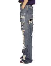 Wide-leg denim jeans with ripped details and abrasions - | Dolce & Gabbana