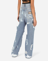 Jeans with ripped details - | Dolce & Gabbana