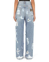 Jeans with ripped details - | Dolce & Gabbana