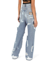 Jeans with ripped details - | Dolce & Gabbana