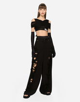 Flared jeans with ripped details - | Dolce & Gabbana
