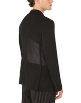 Deconstructed double-breasted jacket - | Dolce & Gabbana