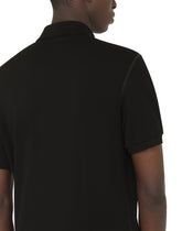 Cotton piqué polo-shirt with branded tag - | Dolce & Gabbana