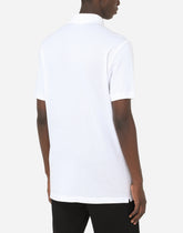 Cotton piqué polo-shirt with branded tag - | Dolce & Gabbana