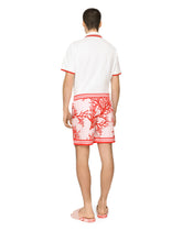 Cotton piqué polo-shirt with heraldic patch - | Dolce & Gabbana