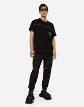 Cotton round-neck T-shirt with embossed DG logo - | Dolce & Gabbana