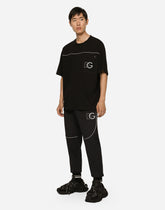Cotton round-neck T-shirt with embossed DG logo - | Dolce & Gabbana