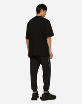 Cotton round-neck T-shirt with embossed DG logo - | Dolce & Gabbana