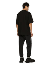 Cotton round-neck T-shirt with embossed DG logo - | Dolce & Gabbana