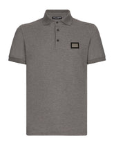 Cotton piqué polo-shirt with branded tag - | Dolce & Gabbana