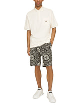 Terrycloth polo-shirt with logo tag - | Dolce & Gabbana