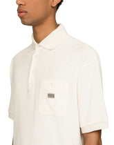 Terrycloth polo-shirt with logo tag - | Dolce & Gabbana