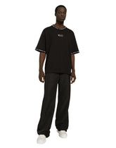 Short-sleeved cotton T-shirt with all-over logo - | Dolce & Gabbana