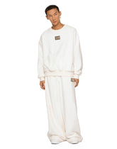 Round-neck terrycloth sweatshirt with logo tag - | Dolce & Gabbana