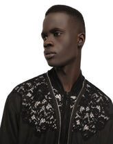 Nylon jacket with lace inserts and DG patch - | Dolce & Gabbana