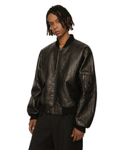 Faux leather jacket with branded tag - | Dolce & Gabbana