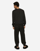 Jersey sweatshirt with studs and DG patch - | Dolce & Gabbana