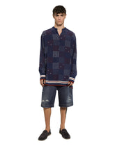 Blue denim shorts with abrasions - | Dolce & Gabbana