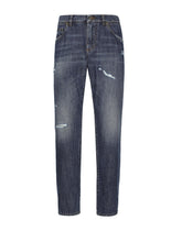 Classic blue denim jeans with abrasions - | Dolce & Gabbana