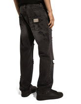 Classic denim jeans with rips and abrasions - | Dolce & Gabbana