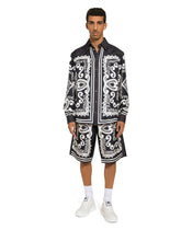 Silk and stretch denim shorts with Marina print - | Dolce & Gabbana