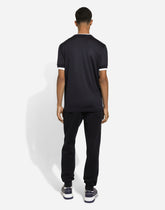 Cotton jogging pants with tag - | Dolce & Gabbana