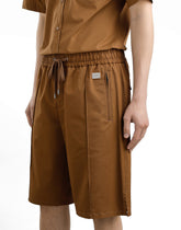 Cotton Bermuda shorts with plaque - | Dolce & Gabbana
