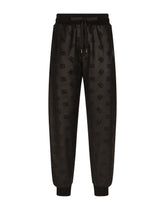 Jogging pants with embossed DG logo - | Dolce & Gabbana