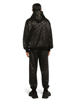 Jogging pants with embossed DG logo - | Dolce & Gabbana